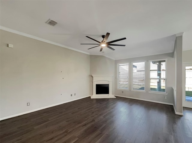 unfurnished living room featuring dark hardwood / wood-style floors, ceiling fan, and crown molding