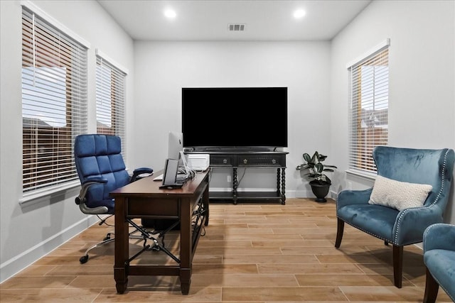 office area with light wood-type flooring