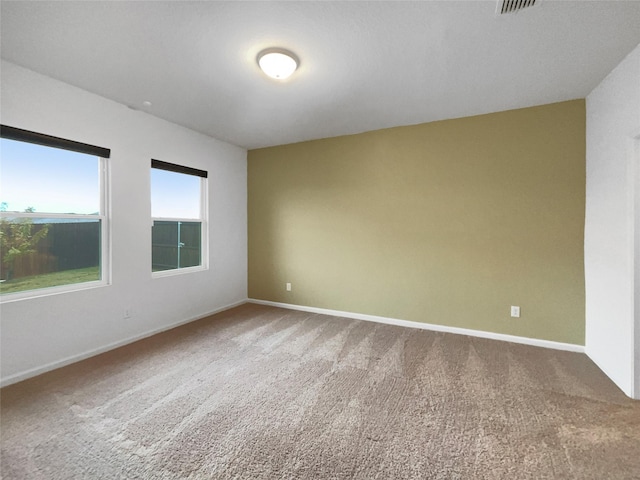 view of carpeted spare room