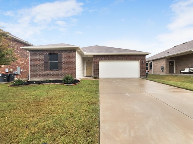 ranch-style house with a garage and a front lawn