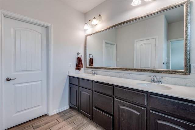 bathroom featuring vanity and wood-type flooring