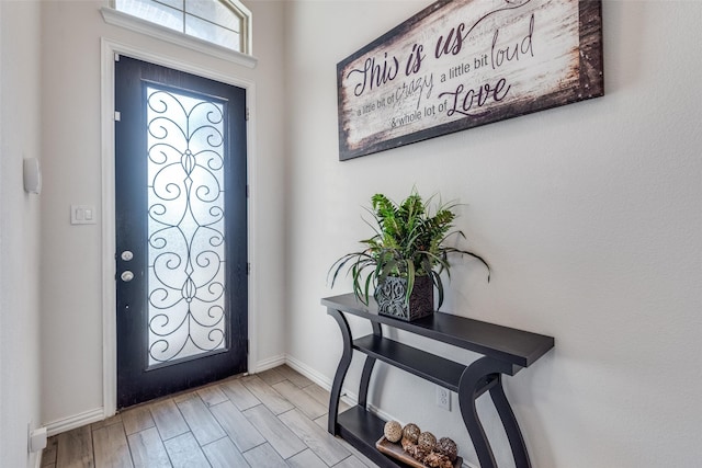 entryway with light hardwood / wood-style flooring