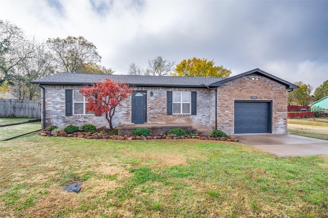 ranch-style house with a front yard and a garage