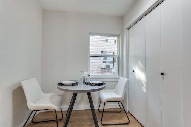 dining area with light wood-type flooring