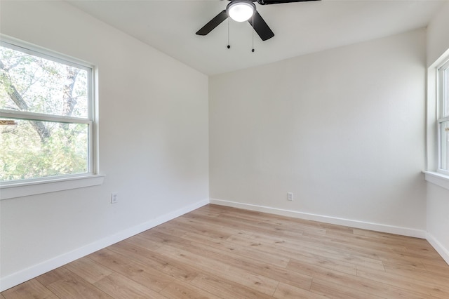 unfurnished room with light hardwood / wood-style floors and ceiling fan