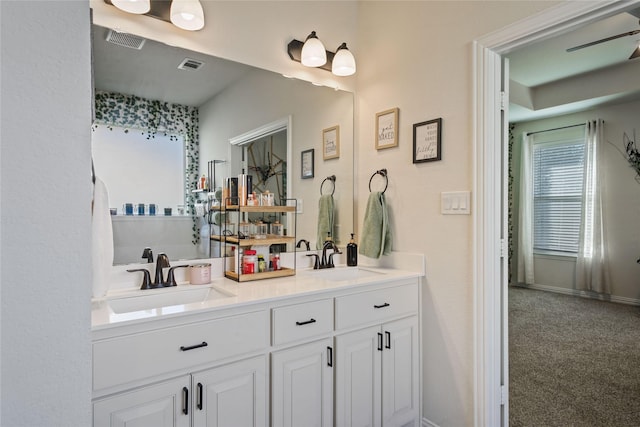 bathroom featuring vanity and ceiling fan