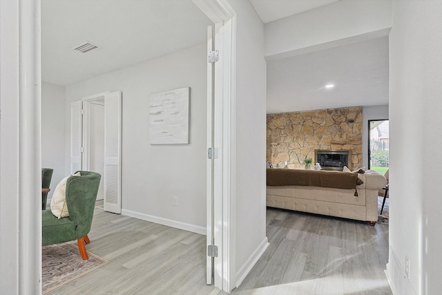 hallway featuring light hardwood / wood-style flooring