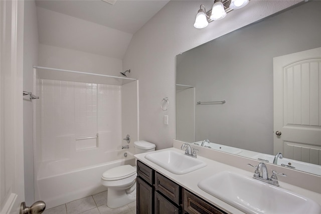 full bathroom featuring lofted ceiling, tile patterned floors, toilet, vanity, and shower / bath combination