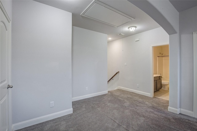 empty room featuring carpet flooring