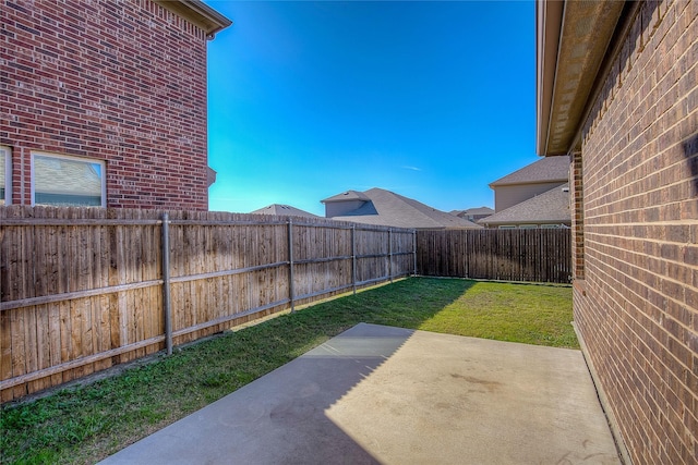 view of yard with a patio area