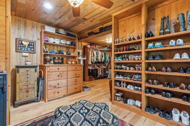 walk in closet featuring light hardwood / wood-style flooring