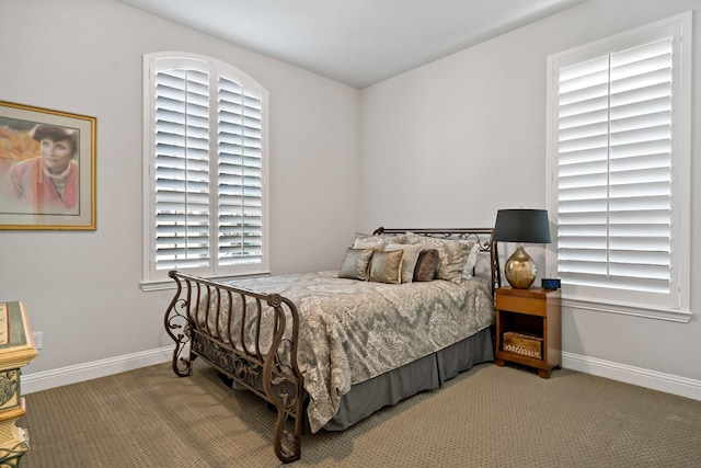 bedroom featuring carpet