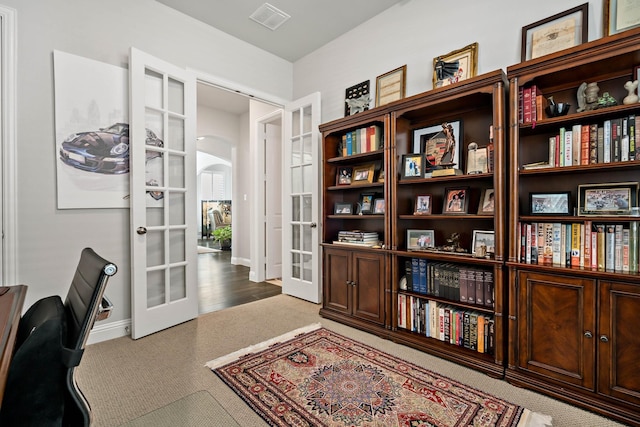 office area featuring french doors and hardwood / wood-style flooring