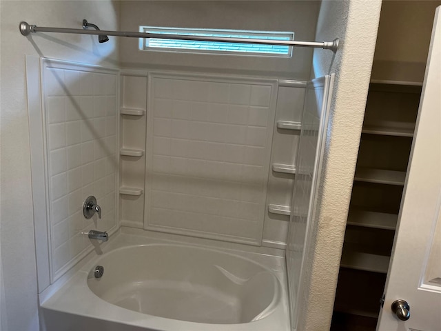 bathroom with shower / bathing tub combination