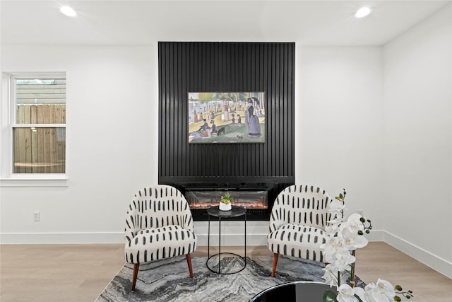 living area featuring light hardwood / wood-style floors