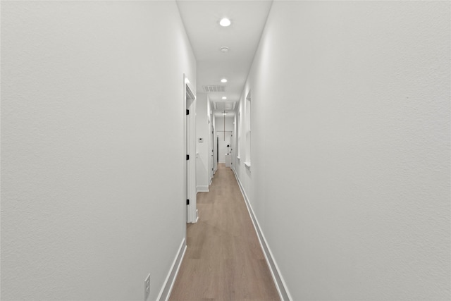 corridor featuring light wood-type flooring