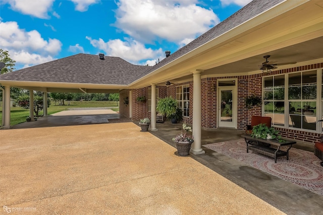 view of patio featuring ceiling fan