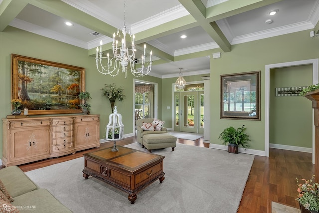 living room with dark hardwood / wood-style floors, beam ceiling, coffered ceiling, crown molding, and an inviting chandelier