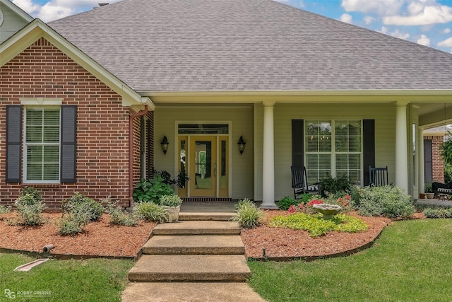 entrance to property featuring a porch