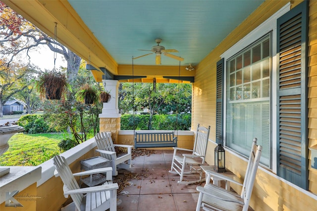 view of patio / terrace featuring ceiling fan and covered porch