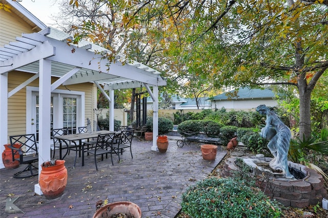 view of patio / terrace with a wooden deck and a pergola