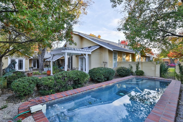 view of pool featuring a pergola