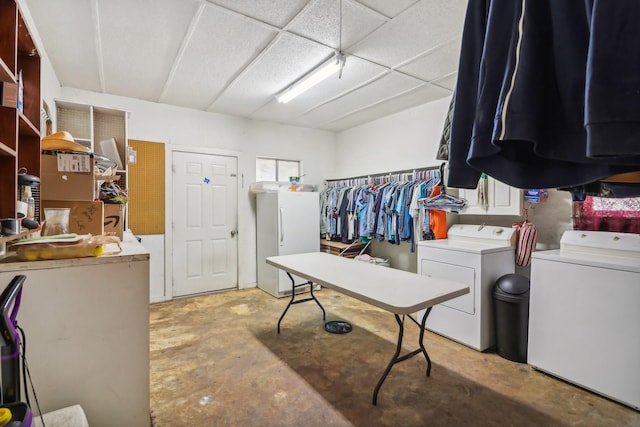 washroom with washer and clothes dryer