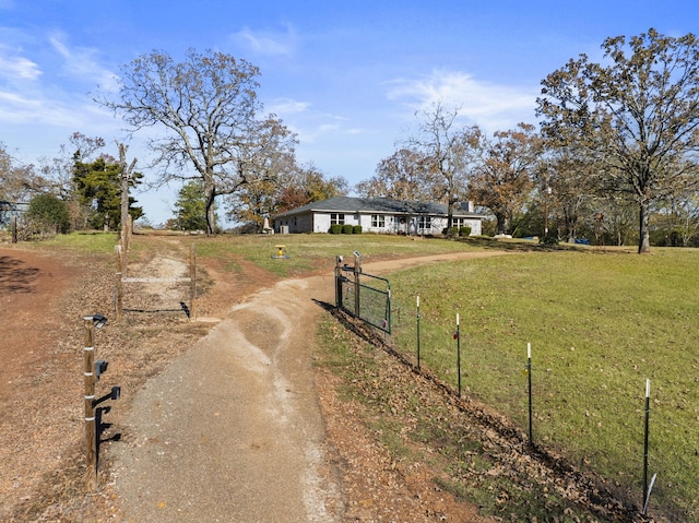 exterior space with a rural view