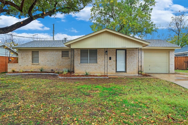 single story home featuring a garage and a front yard