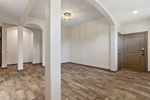 foyer with wood-type flooring