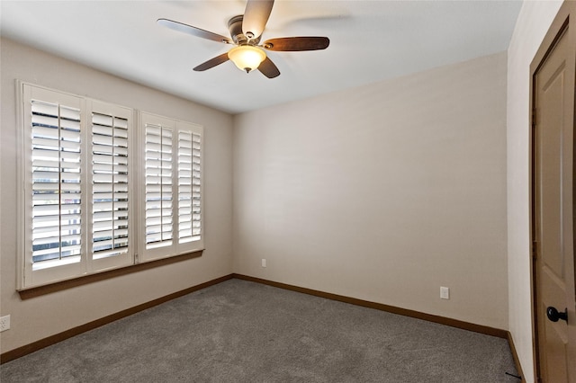 carpeted empty room with ceiling fan