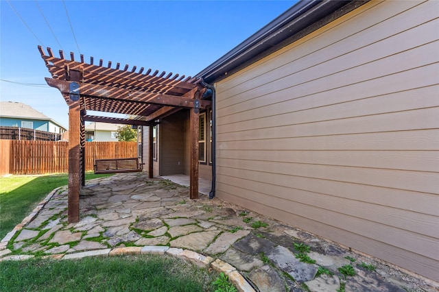 view of patio / terrace featuring a pergola