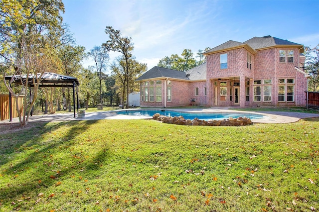 view of pool featuring a gazebo and a yard