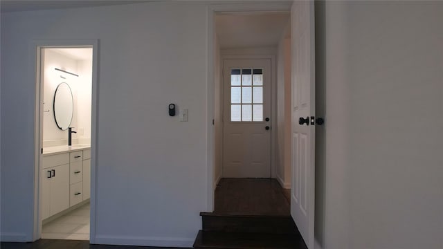 doorway to outside featuring light hardwood / wood-style flooring