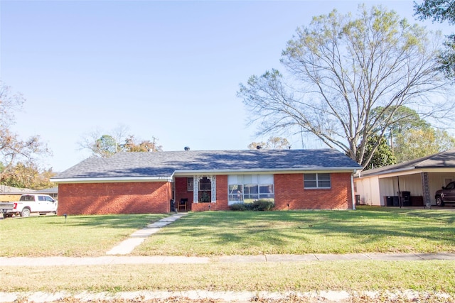 ranch-style house with a front lawn