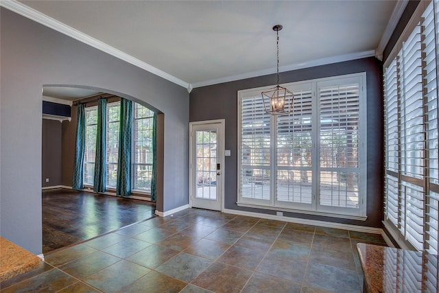 unfurnished dining area featuring a chandelier, dark hardwood / wood-style flooring, a wealth of natural light, and ornamental molding