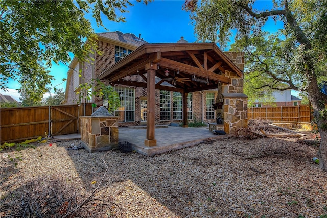 view of patio / terrace featuring ceiling fan