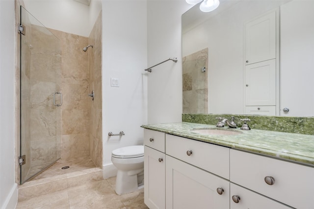 bathroom with vanity, an enclosed shower, tile patterned floors, and toilet