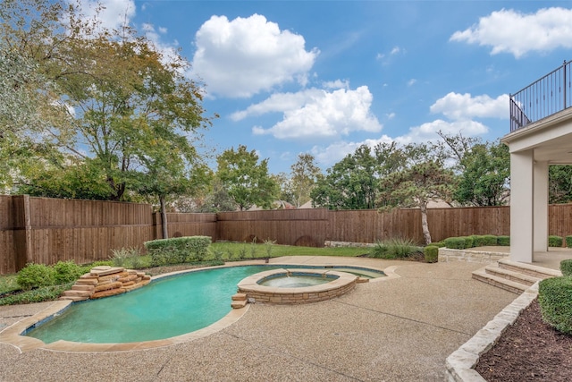 view of pool featuring an in ground hot tub and a patio