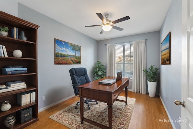 office area featuring ceiling fan and light hardwood / wood-style floors