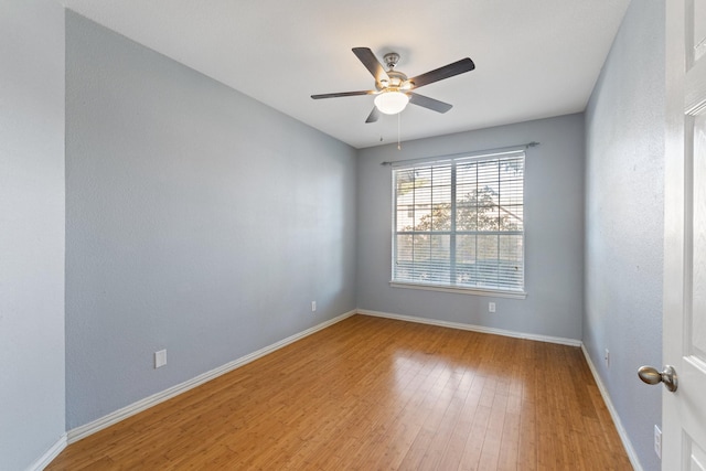 unfurnished room featuring wood-type flooring and ceiling fan