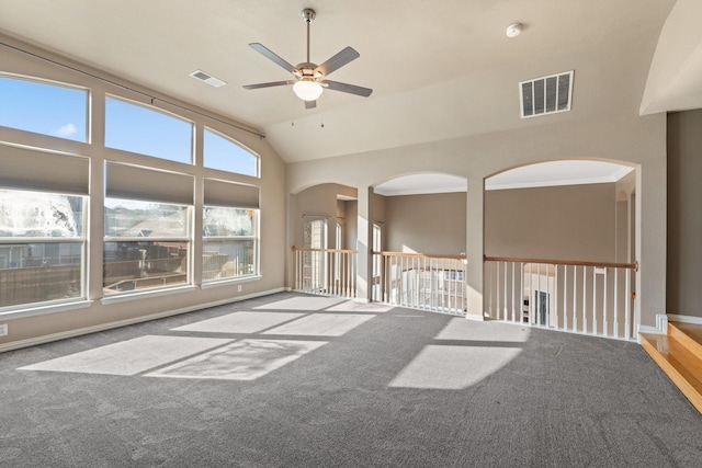 unfurnished room with ceiling fan, crown molding, carpet floors, and vaulted ceiling