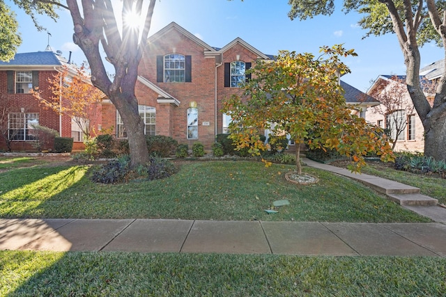 view of front of home featuring a front lawn