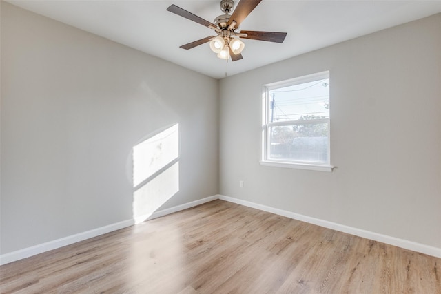 spare room with ceiling fan and light hardwood / wood-style floors