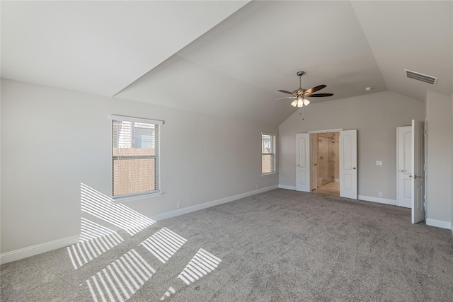 interior space with ceiling fan and lofted ceiling