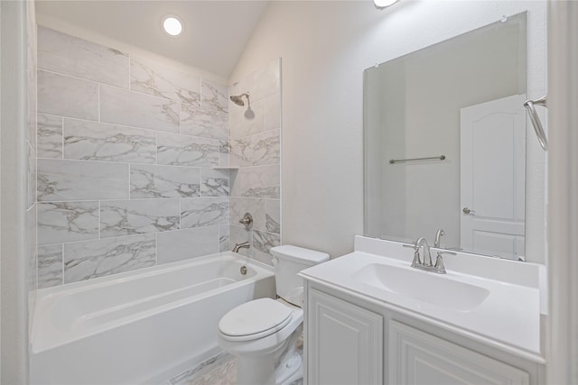 full bathroom with vanity, toilet, and tiled shower / bath combo