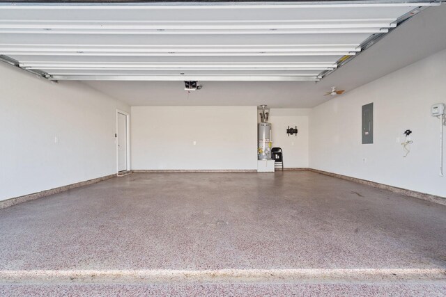 garage featuring a garage door opener, electric panel, and water heater