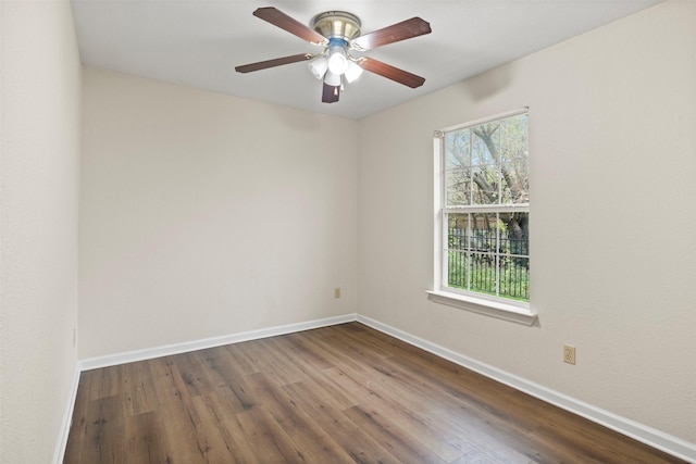 unfurnished room with ceiling fan and wood-type flooring