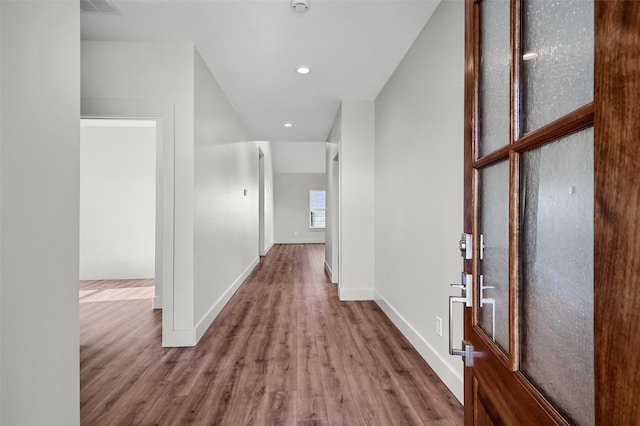 hall featuring light hardwood / wood-style floors