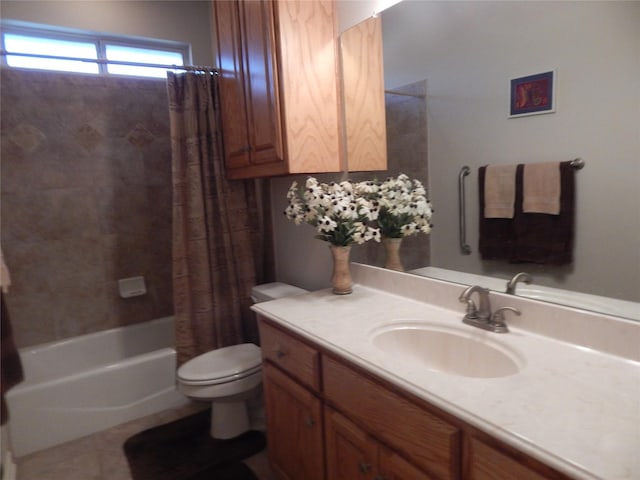 full bathroom with tile patterned floors, shower / bath combo, toilet, and vanity